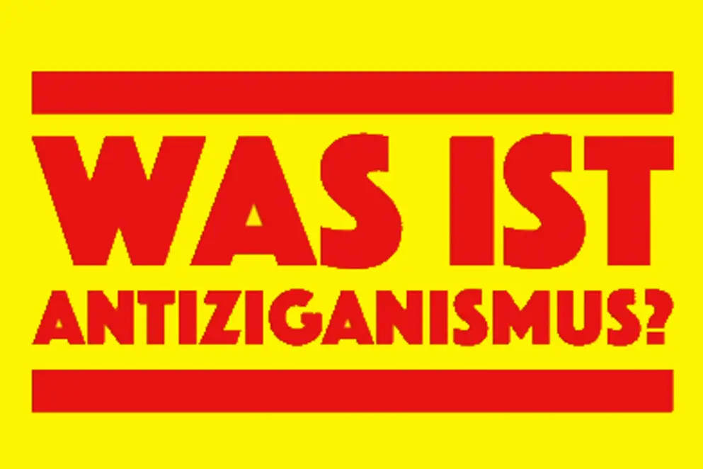 Rote Schrift auf gelben Hintergrund mit dem Text "Was ist Antiziganismus?"